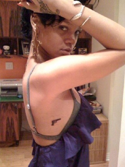 rihanna gun tattoo. Rihanna: New Gun Tattoos!